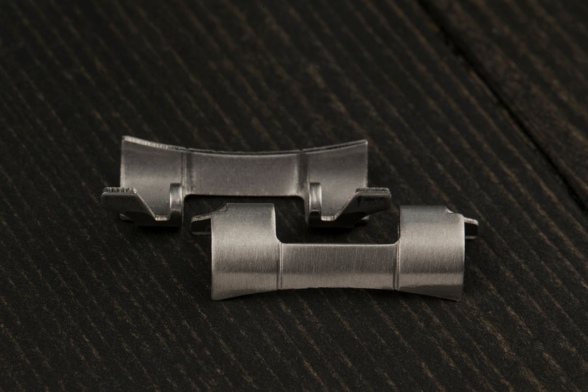 Bending end links to fit new cases