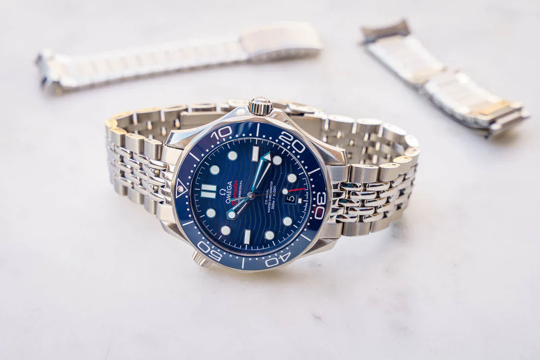 Blue Omega Seamaster on a beads-of-rice bracelet